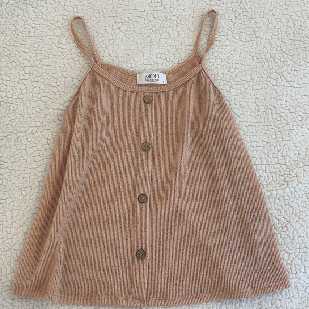 peach/tan colored tank with buttons